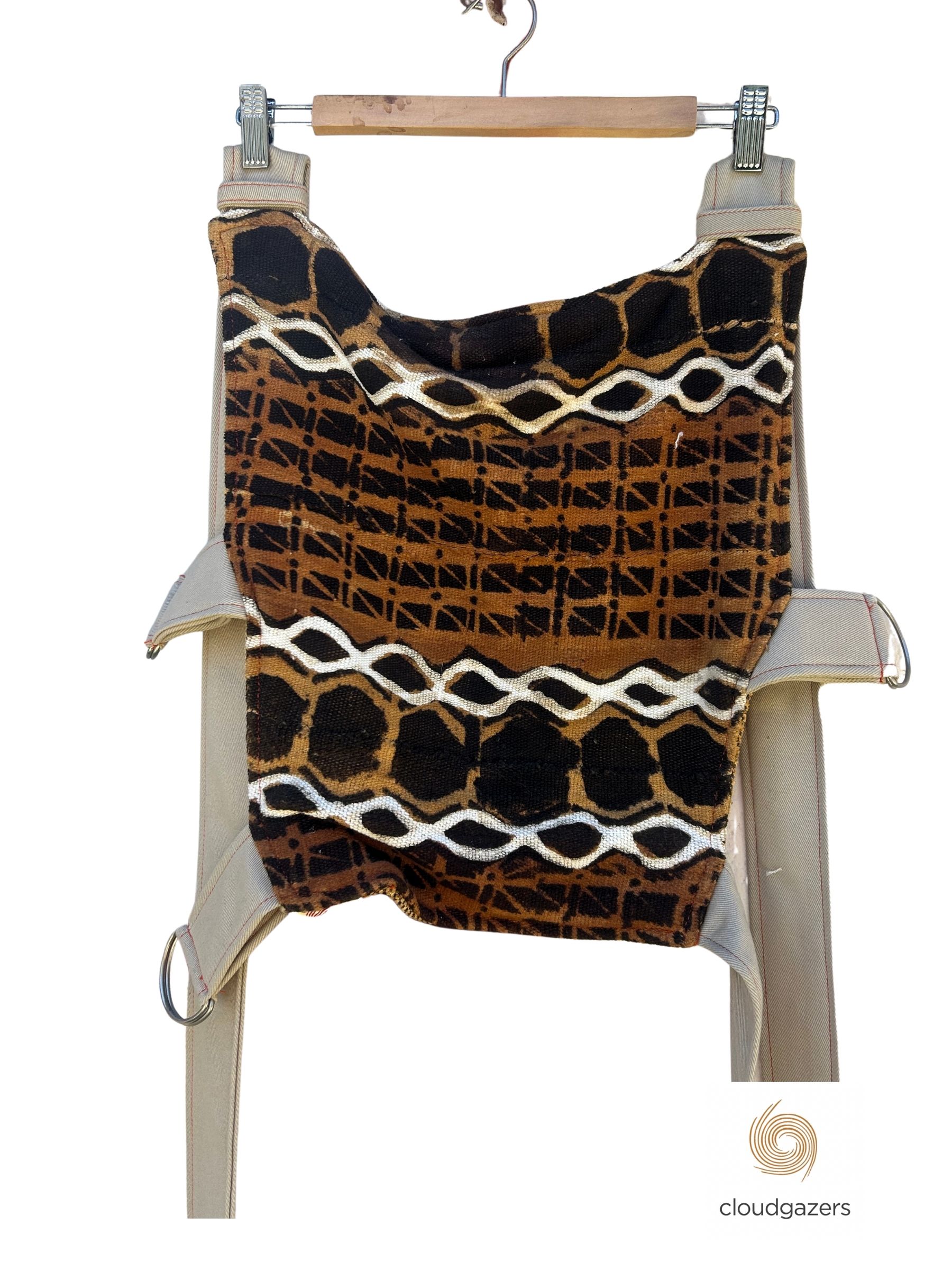 Baby Carrier Handmade One-of-One features unique patterns in earthy tones, adjustable straps, and a stylish design.
