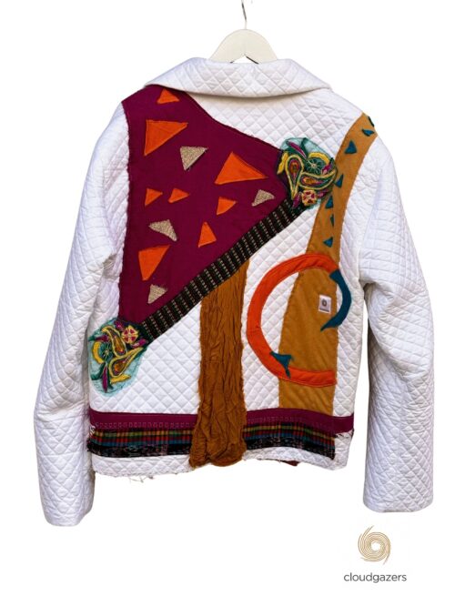 Re-imagined Quilted Statement Jacket featuring a clean ivory base with bold burgundy, orange, and teal appliqué details.