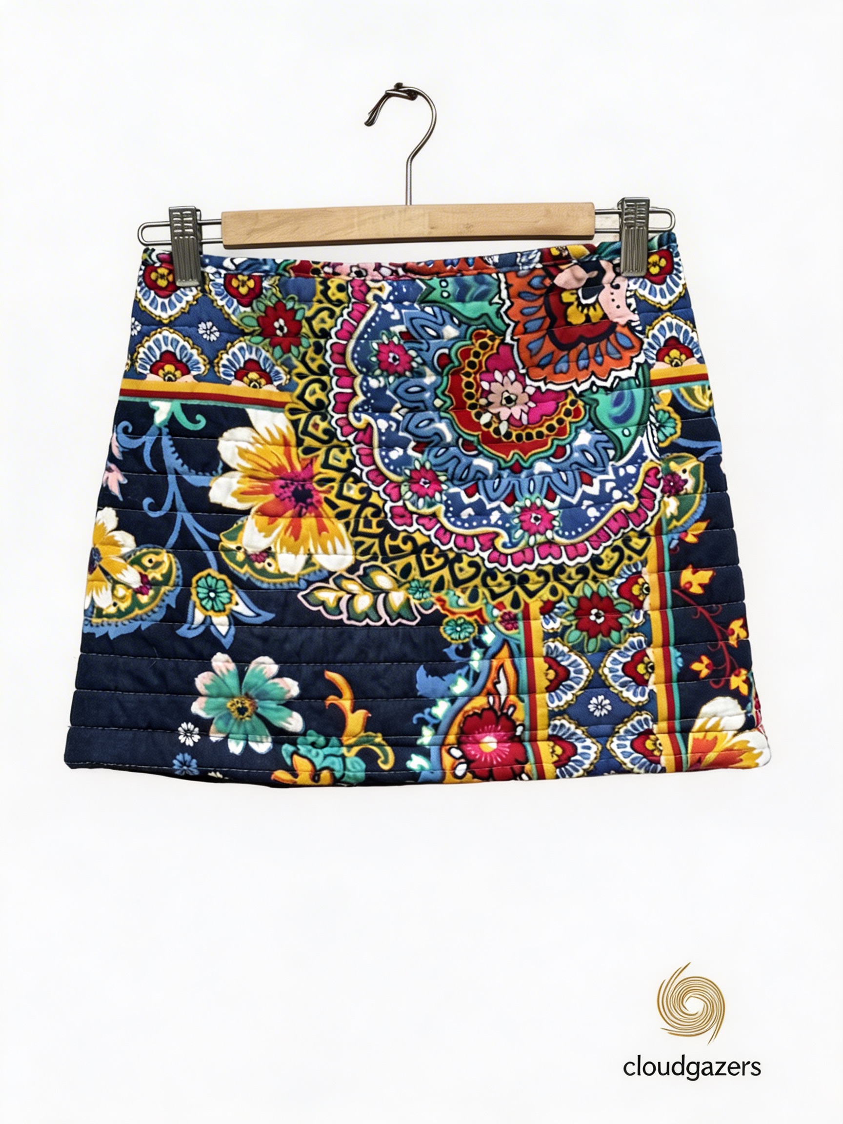 Embroidered Colorblock Mini Skirt featuring quilted floral panels in vibrant colors and a drawstring waist by cloudgazers.
