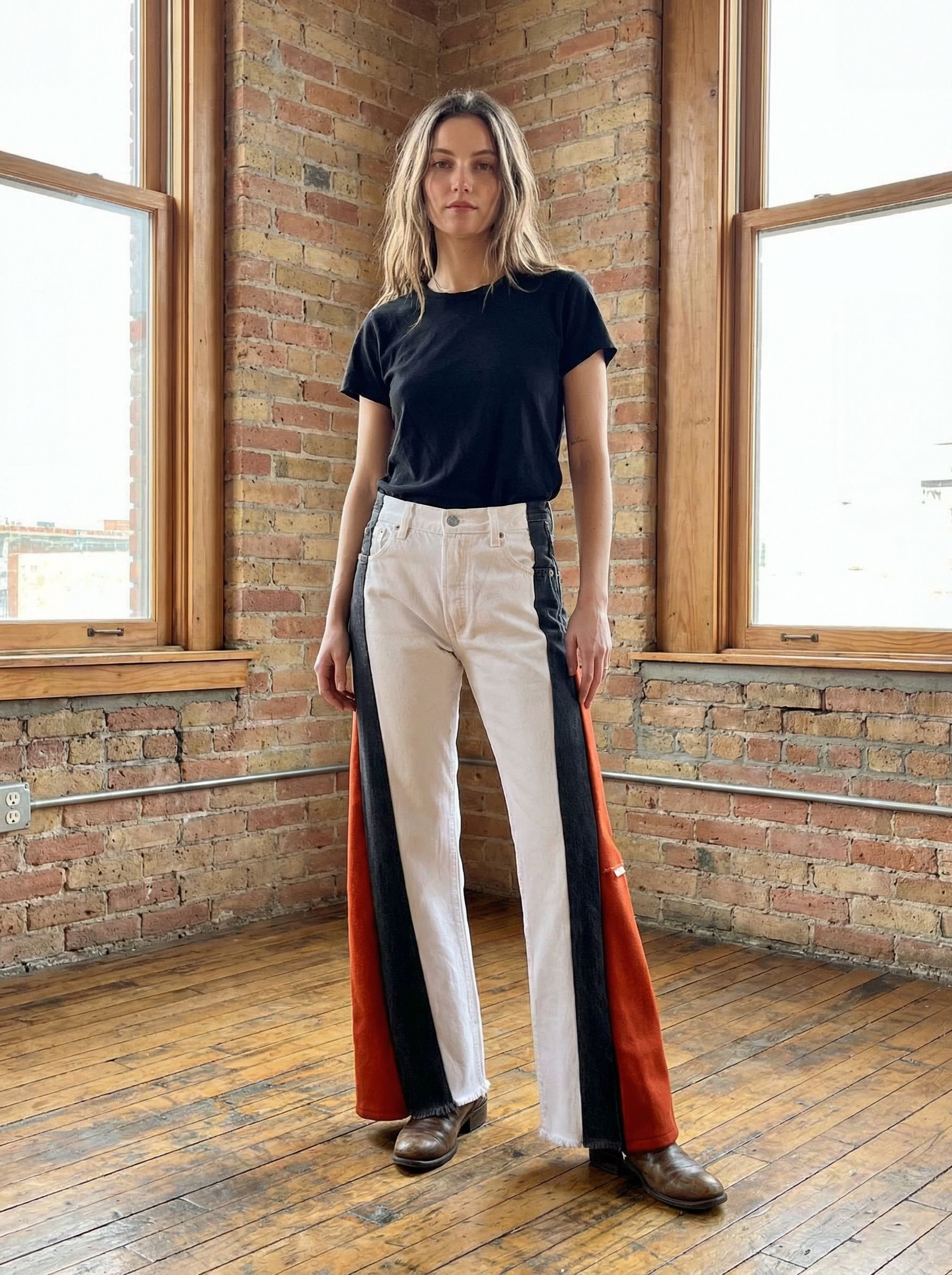 Flare Leg Colorblock Denim Patch Jeans with bold black and orange panels, showcasing unique handmade clothing design.