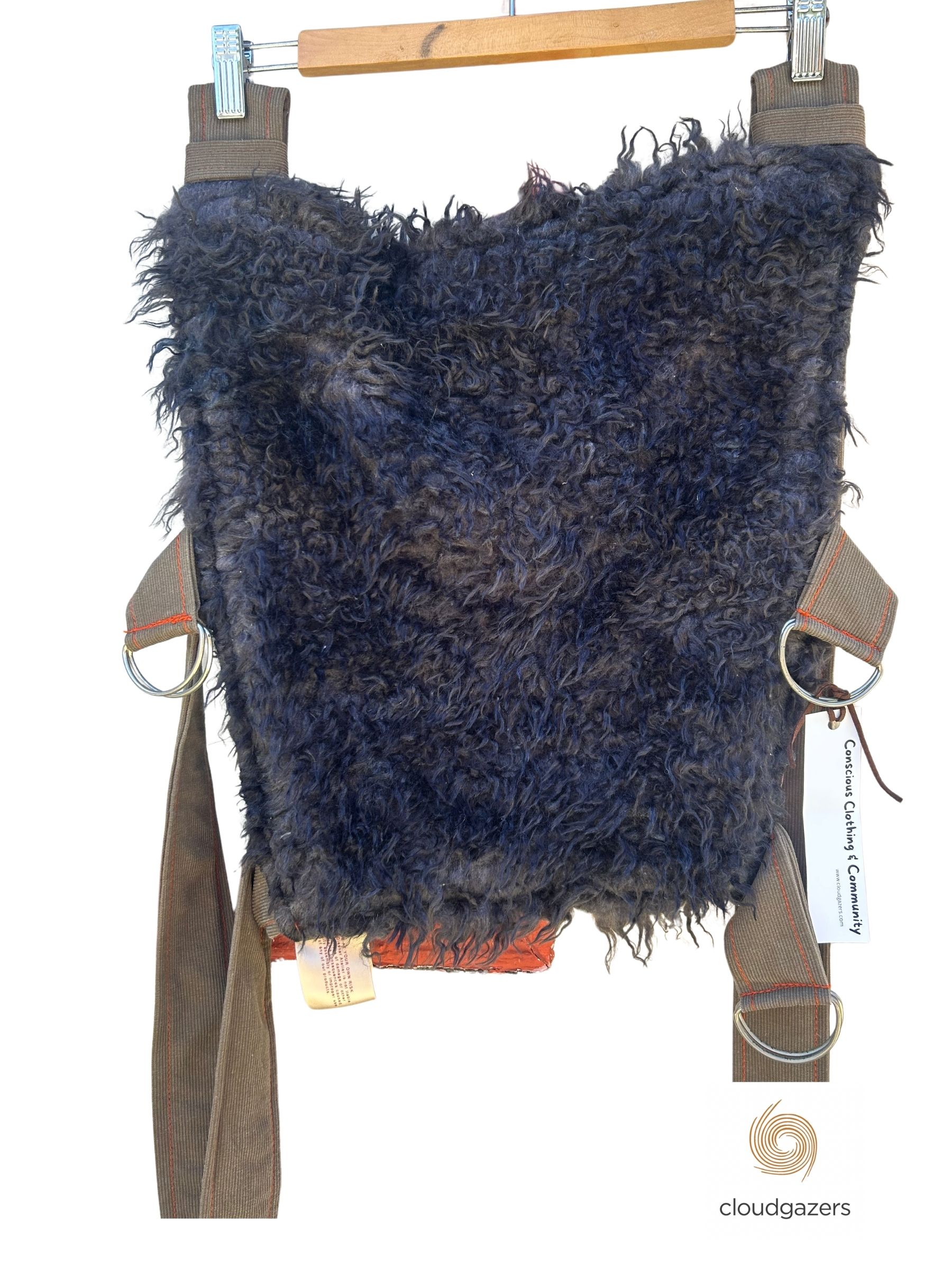 Handmade Baby Carrier One-of-One featuring soft, textured fabric with adjustable straps, embodying conscious fashion.