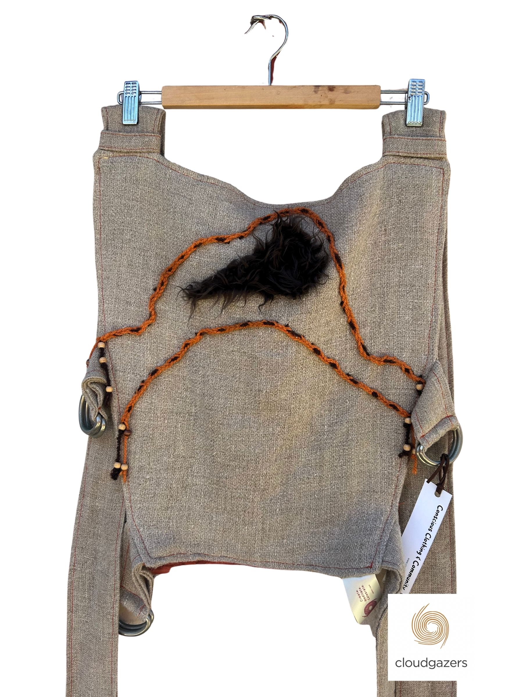 Handmade Baby Carrier One-of-One featuring unique swirl detail, orange and off-white corduroy, adjustable design.