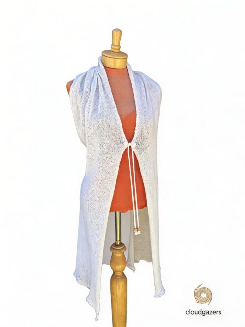 Lightweight Knit Shawl with Drawstring, a handmade open-knit cardigan with adjustable waist and raw edges.