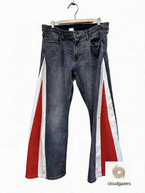 Handmade Vintage Black Jeans with bold red and white side panels, showcasing unique craftsmanship and sustainable fashion.